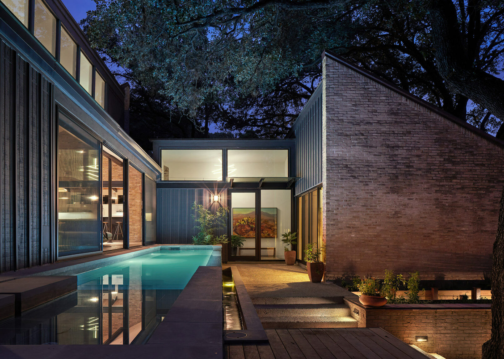 Water Glass project exterior shot with pool at night